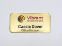 Printed brushed gold metal name tag with clear domed Tag Armor