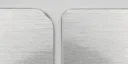 Corner comparison on silver metal: 1/4-inch radius on the left and 1/8-inch radius on the right