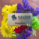 A brushed gold metal nametag