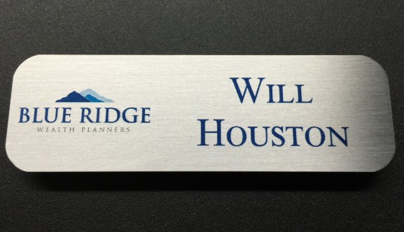 Brushed silver metal nametag. Design for Blue Ridge Wealth Planners.