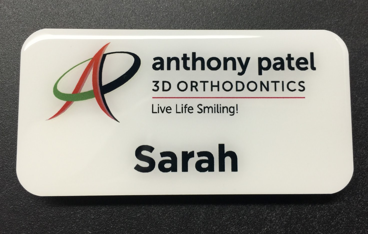 White metal nametag. Design for Anthony Patel 3D Orthodontics.