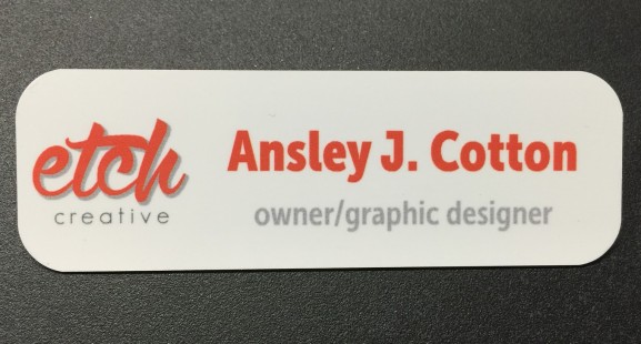 White metal nametag. Design for Etch Creative.