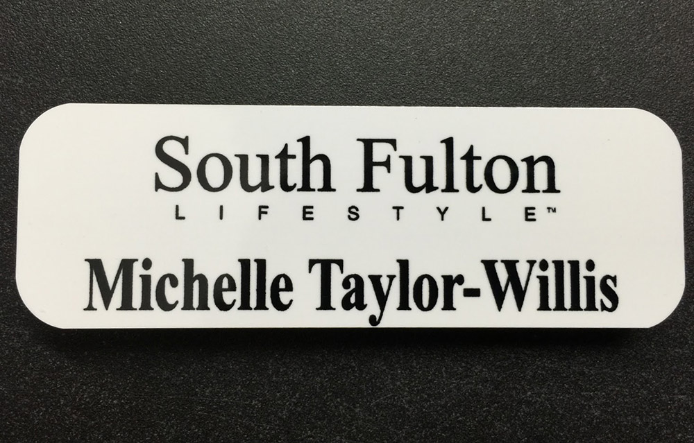 White metal nametag. Design for South Fulton Lifestyle.