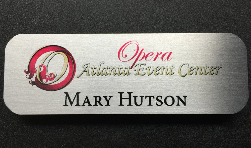 Brushed silver nametag. Design for Opera - Atlanta Event Center.