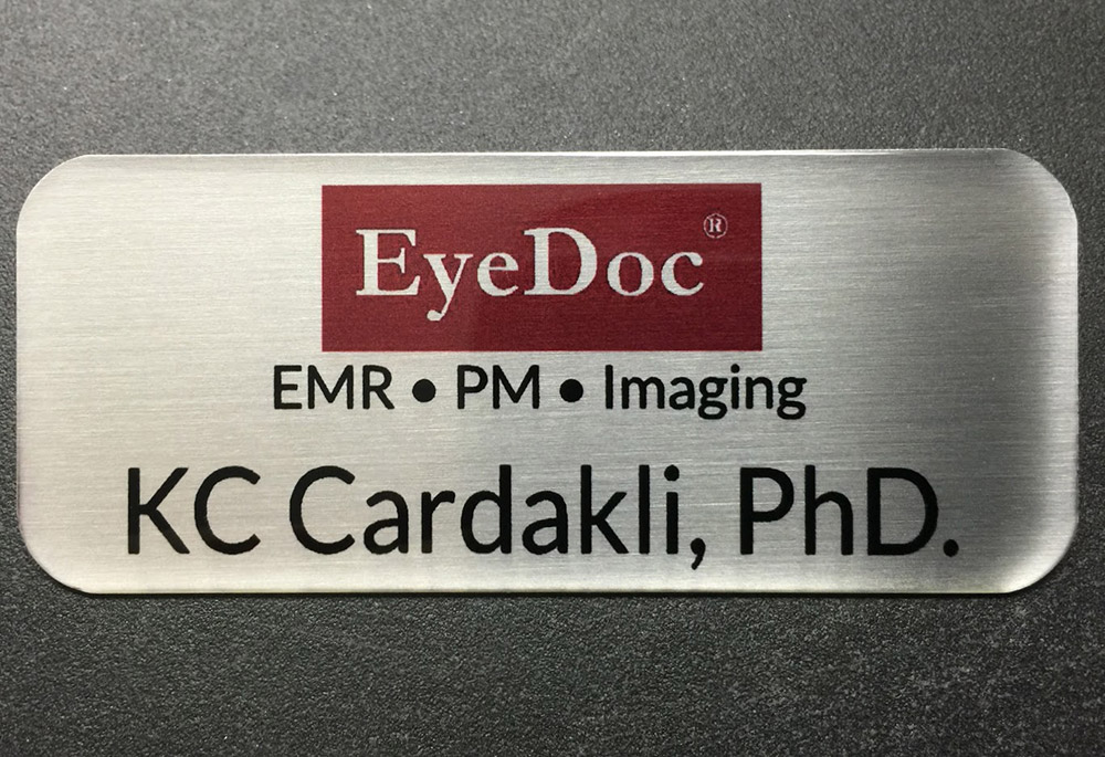 Personalized brushed silver name badge. Design for EyeDoc.