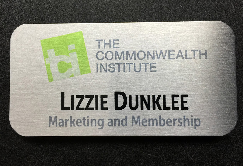 Personalized brushed silver nametag. Design for The Commonwealth Institute.