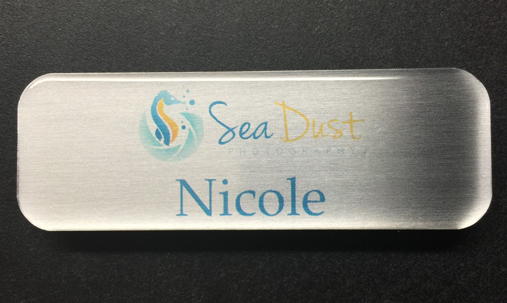 Custom brushed silver nametag. Design for Sea Dust Photography.
