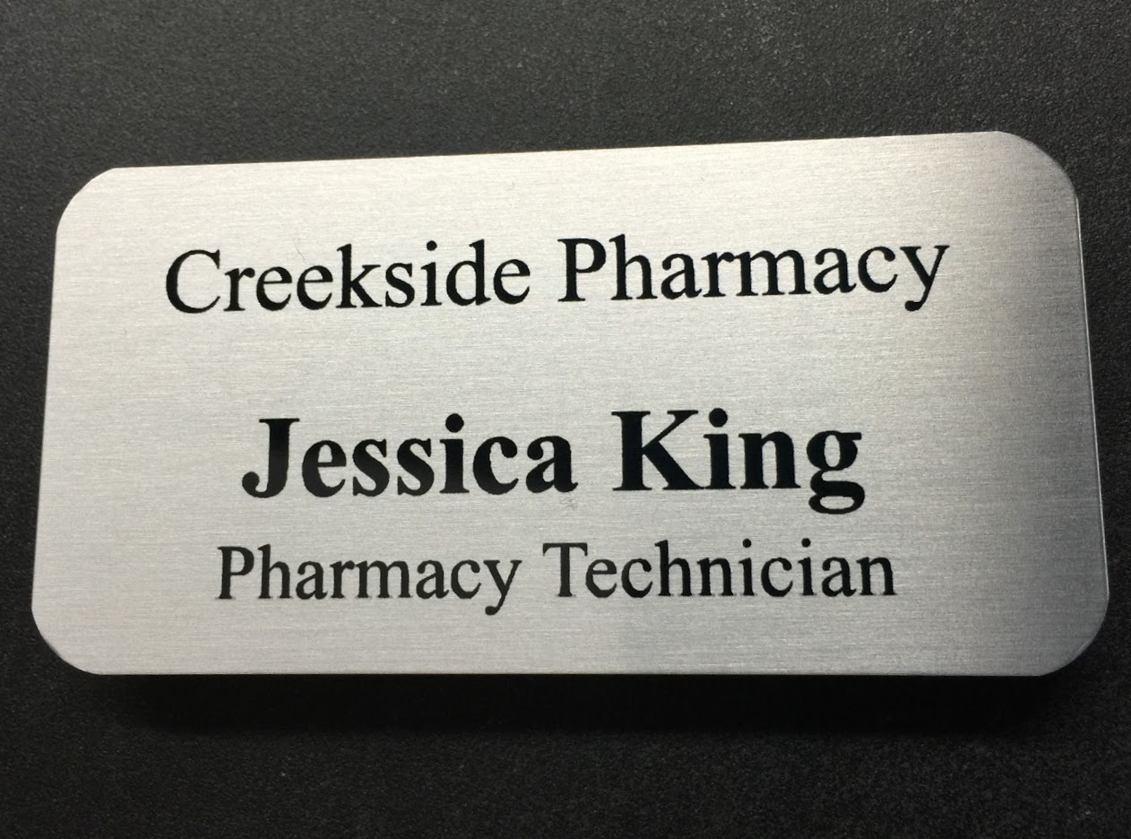 Brushed silver nametag. Design for Creekside Pharmacy.