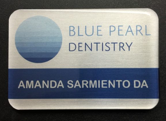 Custom brushed silver name badge. Design for Blue Pearl Dentistry.